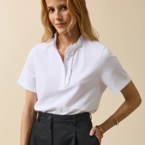 Polo maille piquée col volanté femme