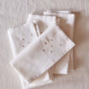 Nappe à pois dorés en coton tramé aspect lin