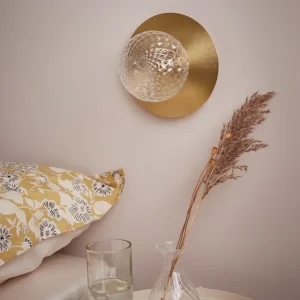 Applique globe et métal